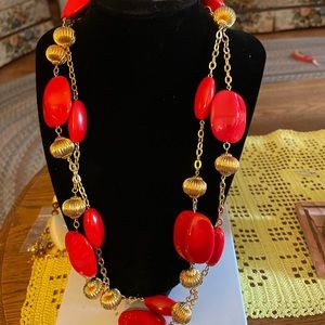 Joan Rivers signed long coralgold tone necklace